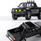 1985 Toyota Hilux SR5 Pick Up Black - Majorette: Collection Deluxe, 1:64 Scale Diecast Car